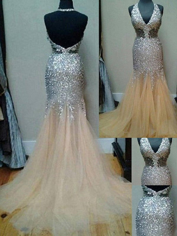 Preciosos vestidos de fiesta de sirena con escote halter, sin mangas, tul, lentejuelas y cola.