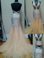 Preciosos vestidos de fiesta de sirena con escote halter, sin mangas, tul, lentejuelas y cola.