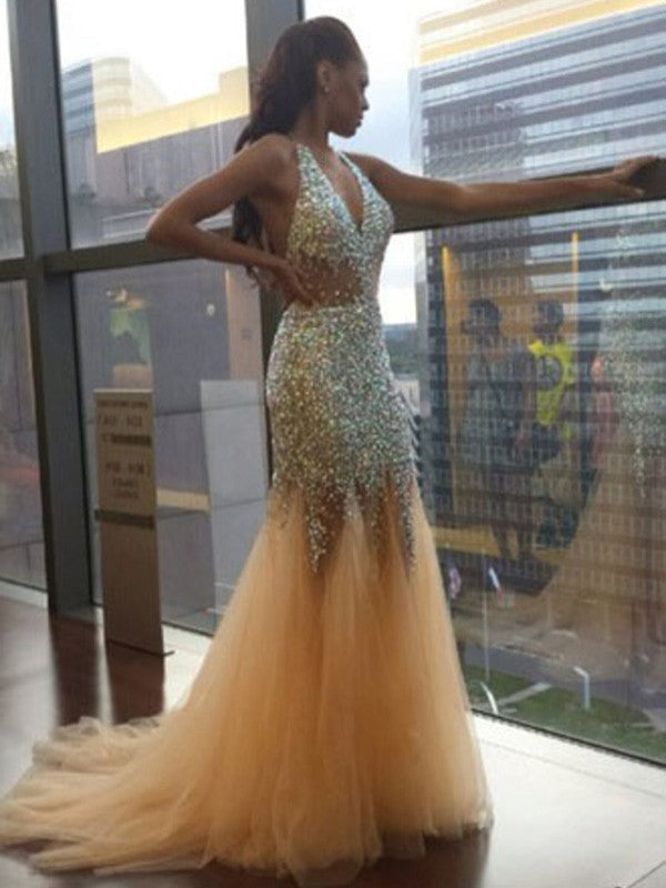 Preciosos vestidos de fiesta de sirena con escote halter, sin mangas, tul, lentejuelas y cola.