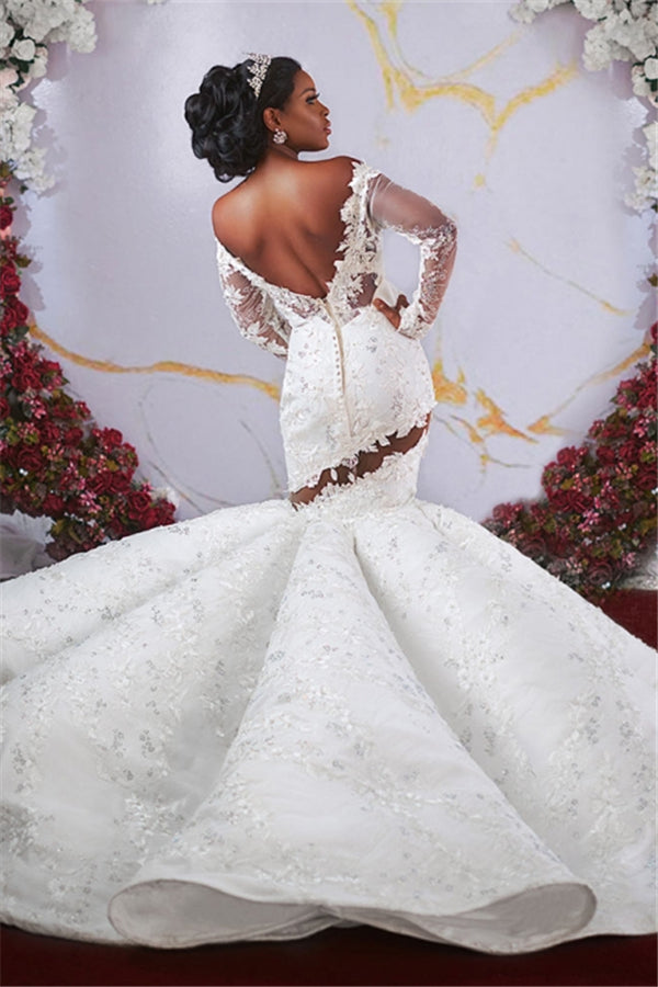 Magnifique robe de mariée sirène à épaules dénudées, manches longues, volants et perles appliquées