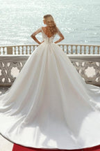 Preciosos vestidos de novia de satén corte princesa, escote en V y mangas largas