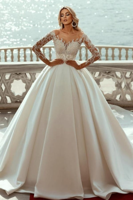 Preciosos vestidos de novia de satén corte princesa, escote en V y mangas largas