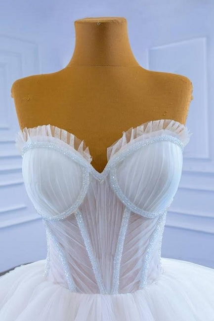 Preciosos vestidos de novia largos blancos de corte princesa, sin mangas y de línea A