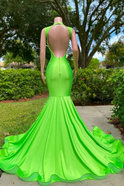 Precioso vestido de fiesta de sirena sin mangas con escote en V, lentejuelas y apliques, de satén elástico.