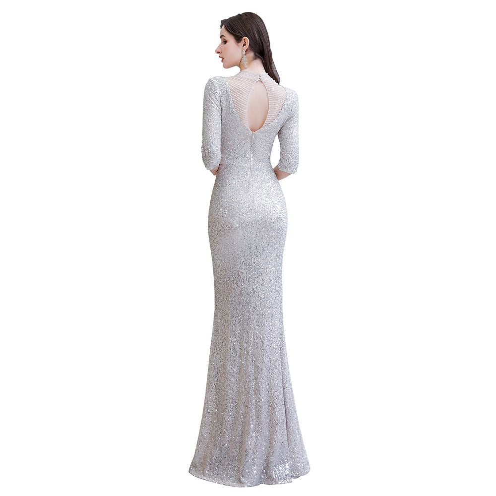 Magnifique robe de bal longue argentée à manches longues