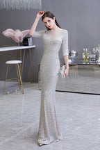 Magnifique robe de bal longue argentée à manches longues