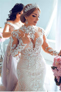 Magnifique robe de mariée sirène en tulle et dentelle à décolleté cœur, idéale pour le printemps et l'été