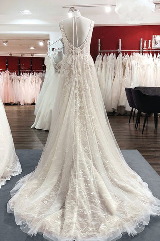 Elegantes vestidos de novia largos de corte A, de tul, con escote en V, espalda descubierta y encaje.