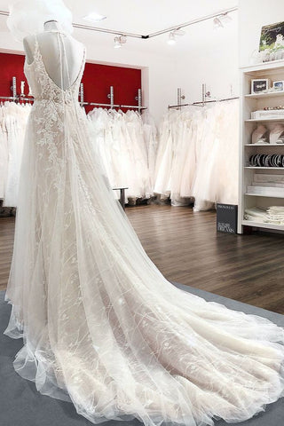 Elegantes vestidos de novia largos de corte A, de tul, con escote en V, espalda descubierta y encaje.