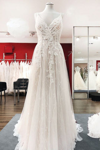 Elegantes vestidos de novia largos de corte A, de tul, con escote en V, espalda descubierta y encaje.