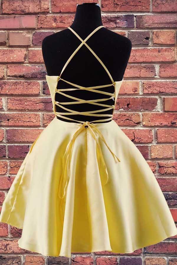 Vestido de fiesta amarillo satinado bordado con cuello halter y bolsillos PD324