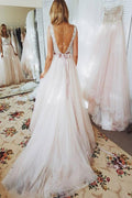 Magnifiques robes de mariée de plage en dentelle, bustier trapèze, dos nu et ceinture. 