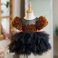 Vestido negro de lentejuelas doradas para bebé niña en su primer cumpleaños 