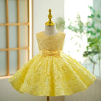 Robe bébé fille jaune à manches pailletées, longueur genou 