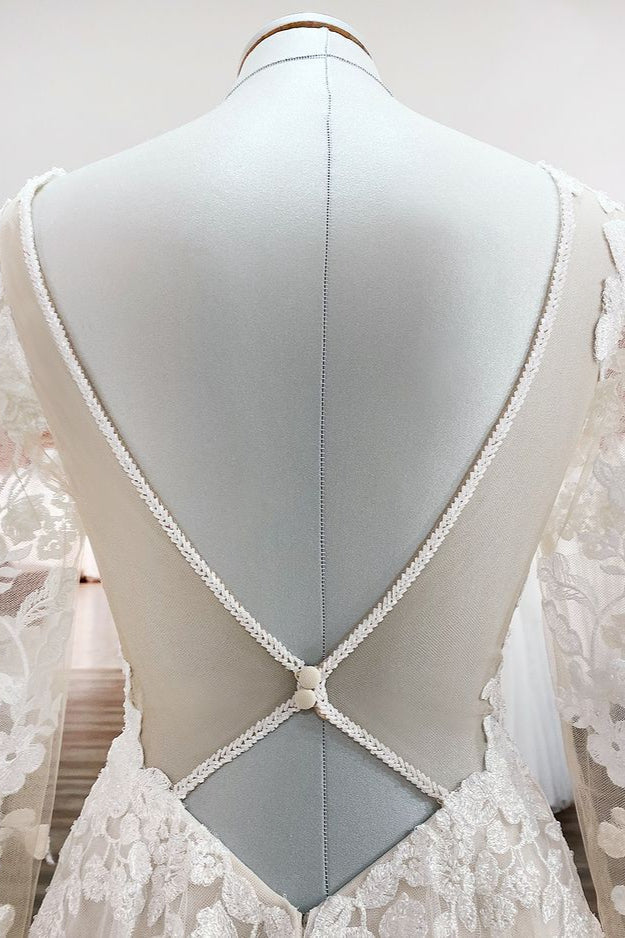 Vestidos de novia color marfil, corte en A, de tul, mangas largas, apliques de encaje y espalda descubierta