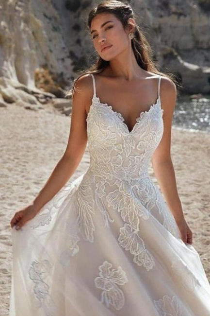 Robe de mariée ivoire à fines bretelles, longue et trapèze
