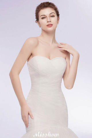 Vestidos de novia de sirena sin tirantes con escote corazón y tul color marfil con cordones