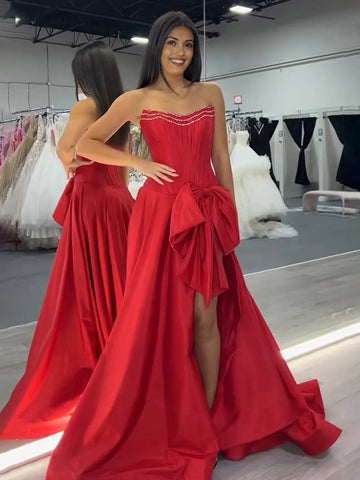 Jhenee | Robe de bal longue bustier rouge tendance en satin, coupe trapèze, avec nœud