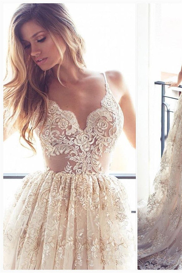 Vestido de fiesta elegante con apliques de encaje, escote en V, espalda descubierta y sin mangas.