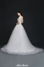 Robe de mariée en tulle avec appliques en dentelle