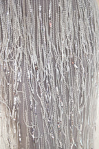 Dernière robe de soirée longue sirène en tulle à franges et perles, col en V