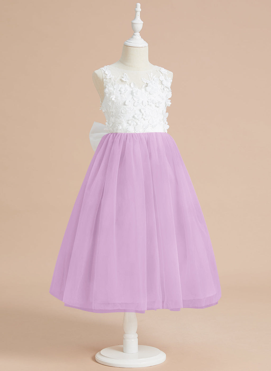 Vestido midi de encaje floral y lazo grande 