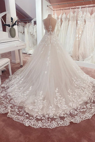 Vestido de novia largo de corte A con apliques de encaje y escote corazón en tul