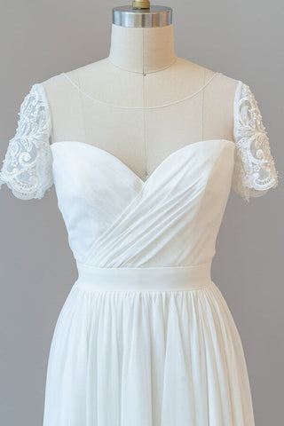 Vestido de novia largo de corte A, de gasa, sin espalda y con mangas