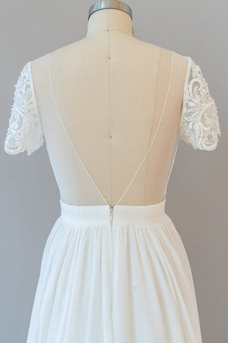 Vestido de novia largo de corte A, de gasa, sin espalda y con mangas