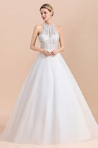 Vestido de novia largo de corte A, sin mangas, con apliques de encaje y lentejuelas, escote halter y apliques de encaje.