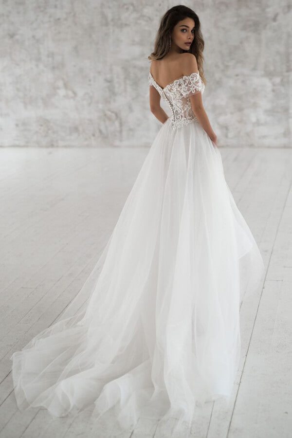 Robe de mariée longue en tulle à manches, épaules dénudées et appliques, coupe trapèze