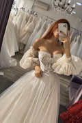 Vestido de novia largo de corte A, hombros descubiertos, apliques de tul y mangas con mangas