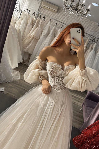 Vestido de novia largo de corte A, hombros descubiertos, apliques de tul y mangas con mangas