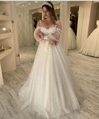 Robe de mariée longue trapèze à bretelles spaghetti et paillettes, manches longues