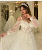 Robe de mariée longue trapèze à bretelles spaghetti et paillettes, manches longues