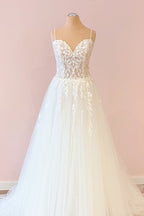 Vestido de novia largo de corte A con escote corazón, apliques de tul y encaje