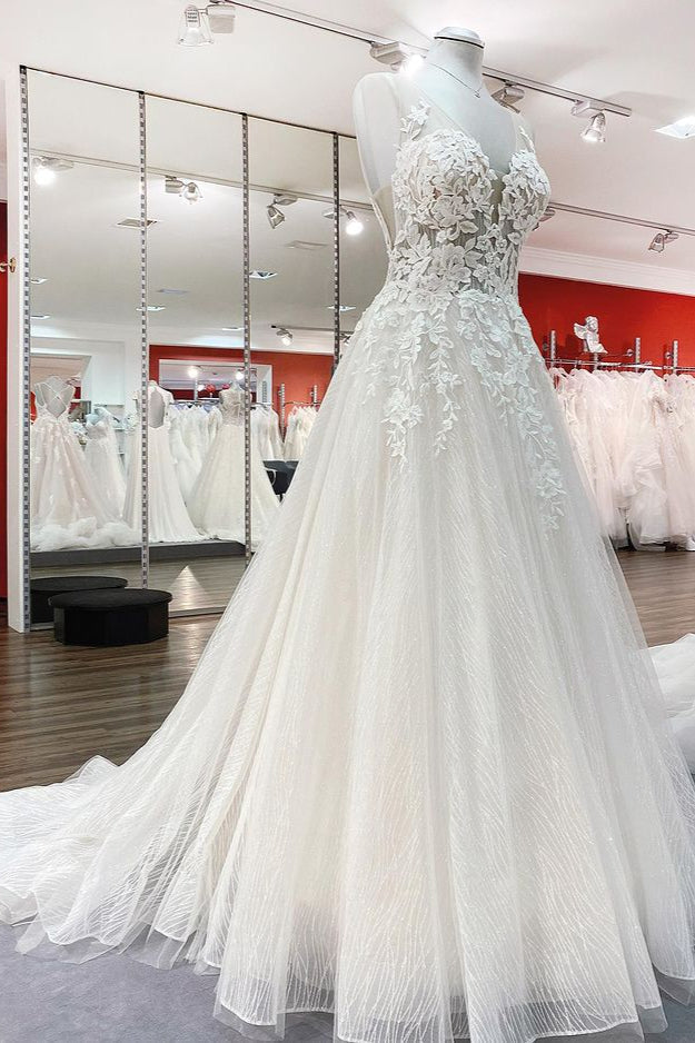 Vestido de novia largo de corte A con escote corazón y espalda descubierta de tul