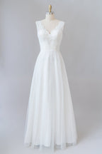 Vestido de novia largo de corte A, escote en V, encaje y tul sin espalda