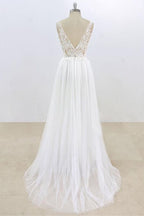Robe de mariée longue trapèze en dentelle et tulle, col en V et dos nu