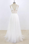 Robe de mariée longue trapèze en dentelle et tulle, col en V et dos nu