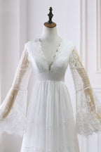 Vestido de novia largo de corte A, escote en V, encaje y tul con mangas