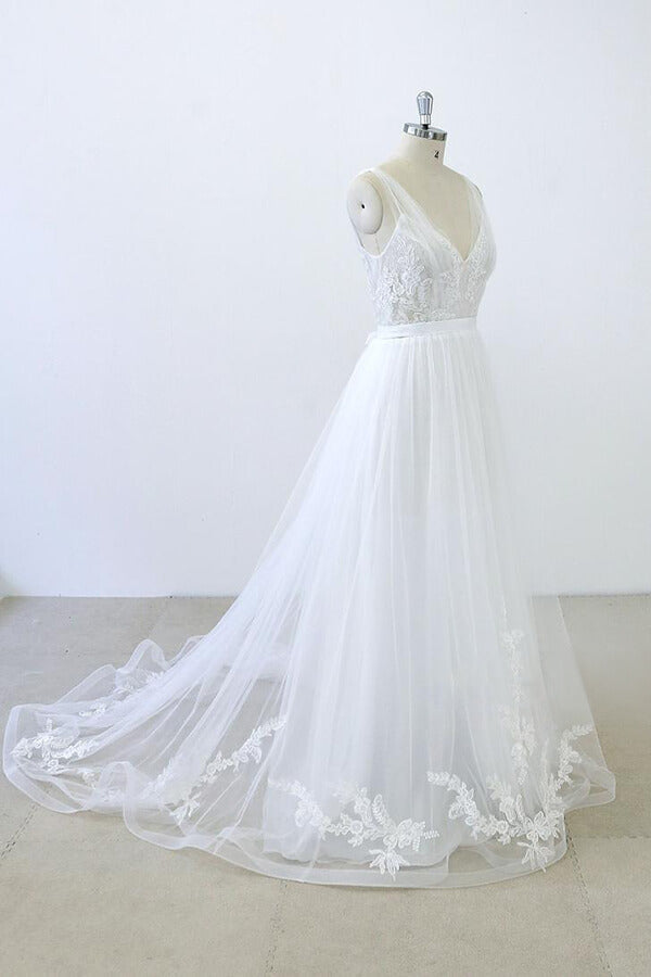 Robe de mariée longue en tulle dos nu, coupe trapèze, décolleté en V, bustier cœur, volants et appliques