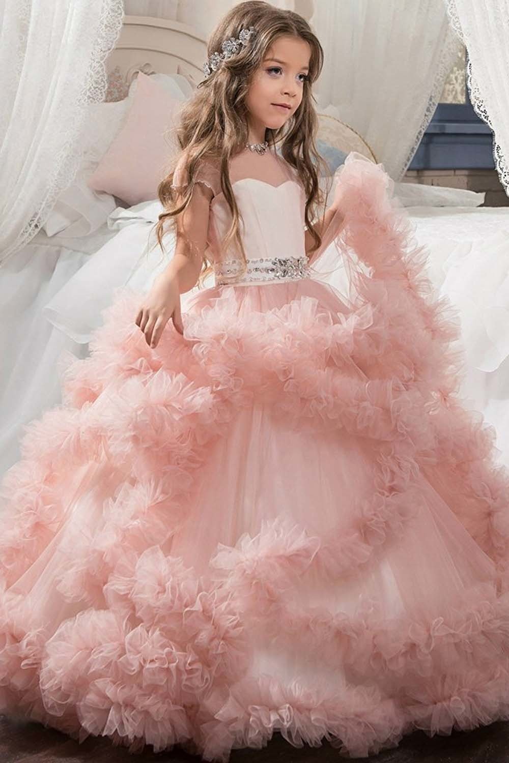 Vestido largo de gala violeta para niña de las flores, con escote redondo y mangas.