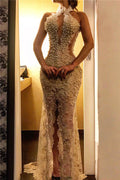 Robe de soirée longue sirène dos nu en dentelle et perles avec fente
