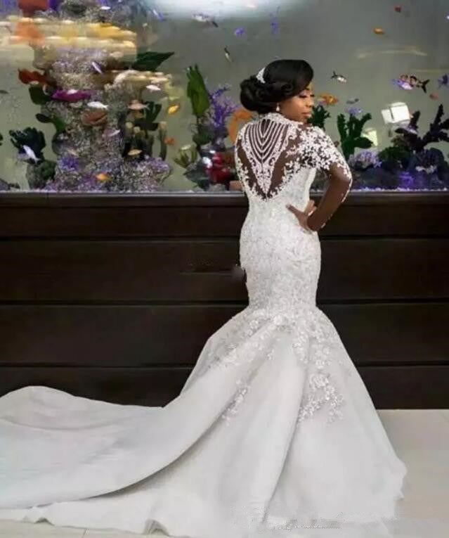 Robe de mariée sirène longue à col montant, ornée de perles et d'appliques en dentelle, avec manches
