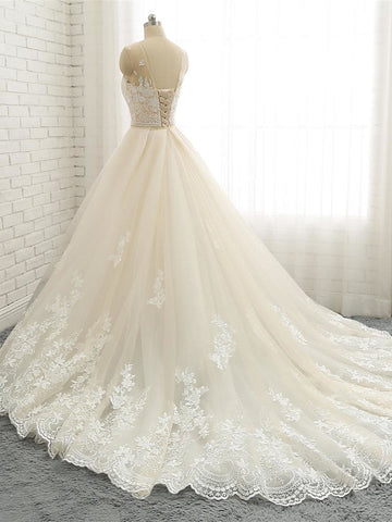 Robe de mariée sirène longue en tulle et dentelle, col bijou et traîne chapelle