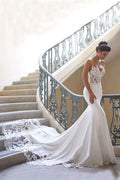 Robe de mariée sirène longue à bretelles spaghetti et dos nu en dentelle