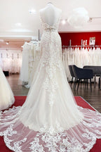 Robe de mariée sirène longue en tulle sans manches et dos nu en dentelle