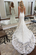 Robe de mariée sirène longue à col en V, dos nu, dentelle appliquée et traîne Charpel