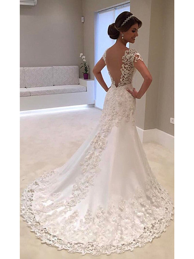 Vestidos de novia largos de sirena con escote en V, tul, encaje y espalda descubierta con mangas cortas.